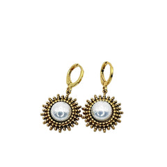 Les boucles d'oreilles - Soleil de perle